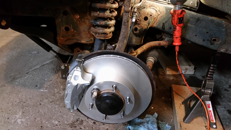 The calipers and rotors are coated for rust-prevention. The rest of the chassis is not.